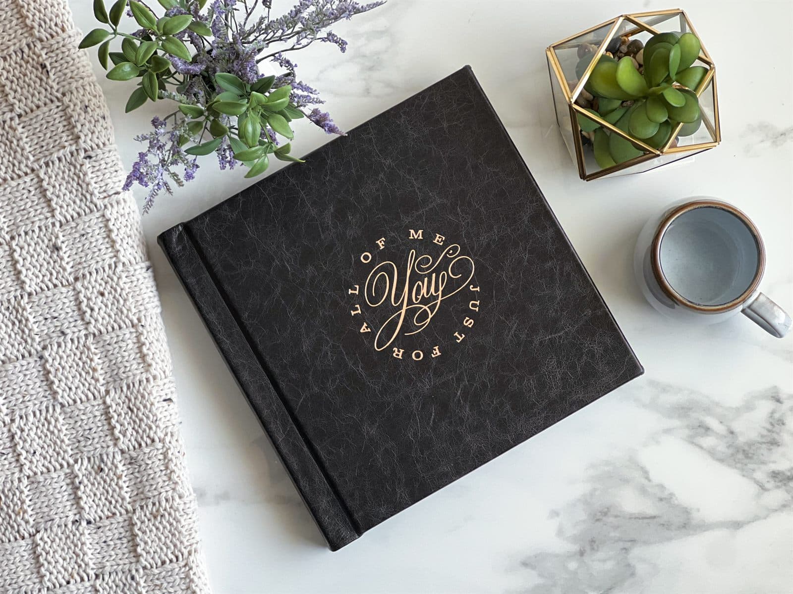 Black leather boudoir album stamped All Of Me Just For You in rose gold foil